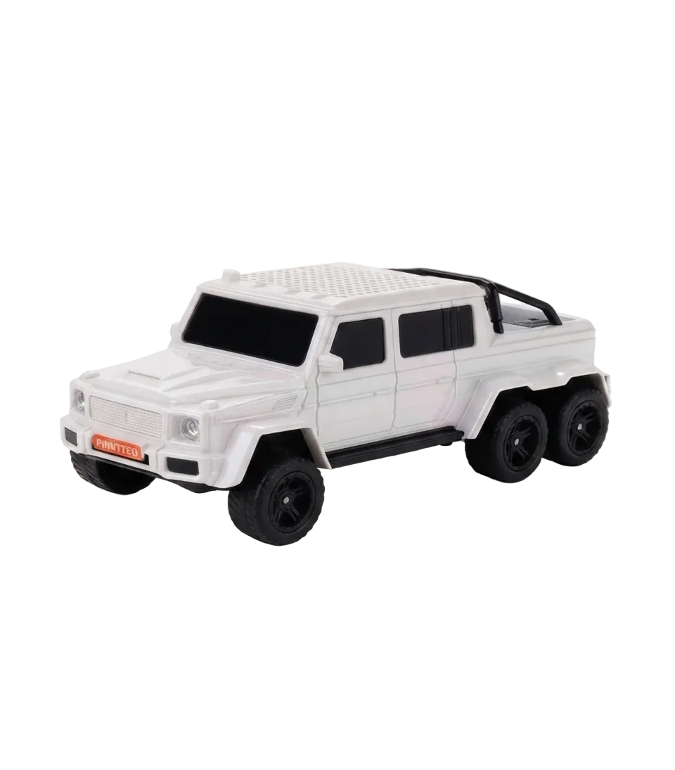A white diecast model of a Mercedes-Benz G-Class 6x6 vehicle with black wheels, black side steps, and a black roll bar, shown on a seamless white background.