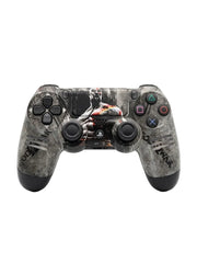 A PlayStation 4 controller with a custom 'Call of Duty: Warzone' themed skin featuring a gritty gray and black camouflage pattern with a soldier graphic in the center.