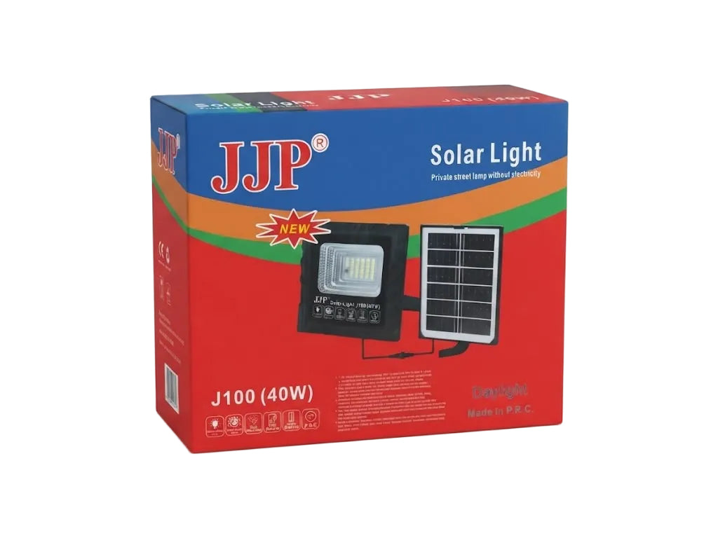 A red and blue retail box for a JJP Solar Light J100 (40W) model, featuring product images of the black LED floodlight and its attached solar panel on a white background.