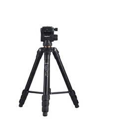 Two black camera tripods photographed on a clean light gray studio background. The tripod on the left is fully extended with a handguard and leg knobs visible, and the tripod on the right is partially folded.