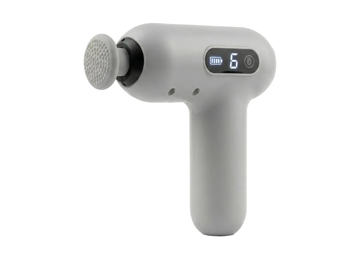 A modern gray handheld massage gun with a digital display showing battery level and mode number 6, set against a plain white background.