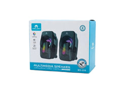 A pair of black multimedia speakers in their original retail packaging, which is white and light blue with product images and specifications printed on the front.