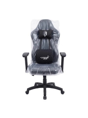 A black gaming chair with a headrest and lumbar support cushion, shown wrapped in clear protective plastic on a white studio background. The cushions feature white printed logos, including 'Ningma' on the headrest and 'Ningma 2.